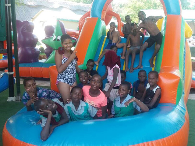 Children enjoying XMAS Party at Tamaindi Lodges <br> FUNDED BY C&C